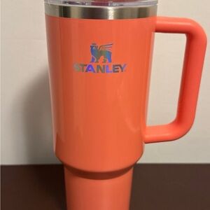 Stanley Coral Orange Travel Mug with Handle